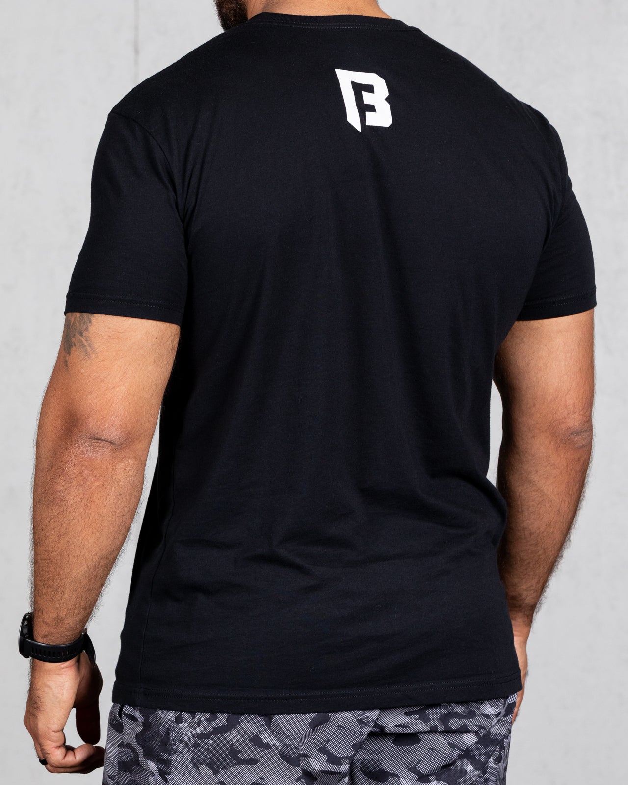 back of trucker tee with bridge b logo