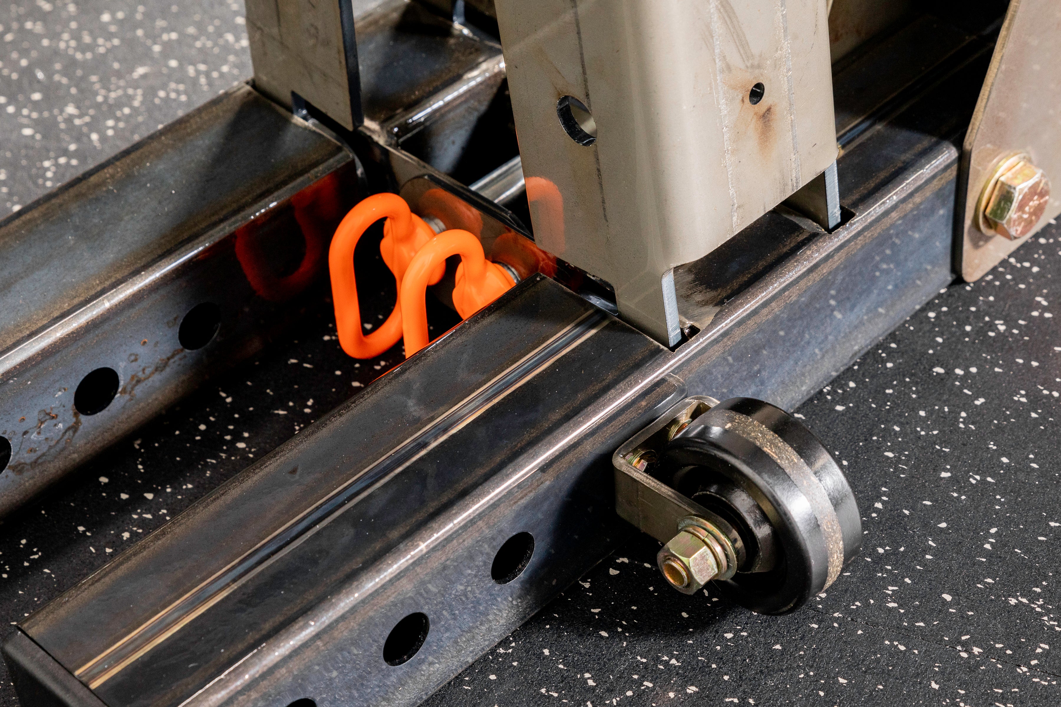 close up of wheels attached to a collapsed phoenix rack