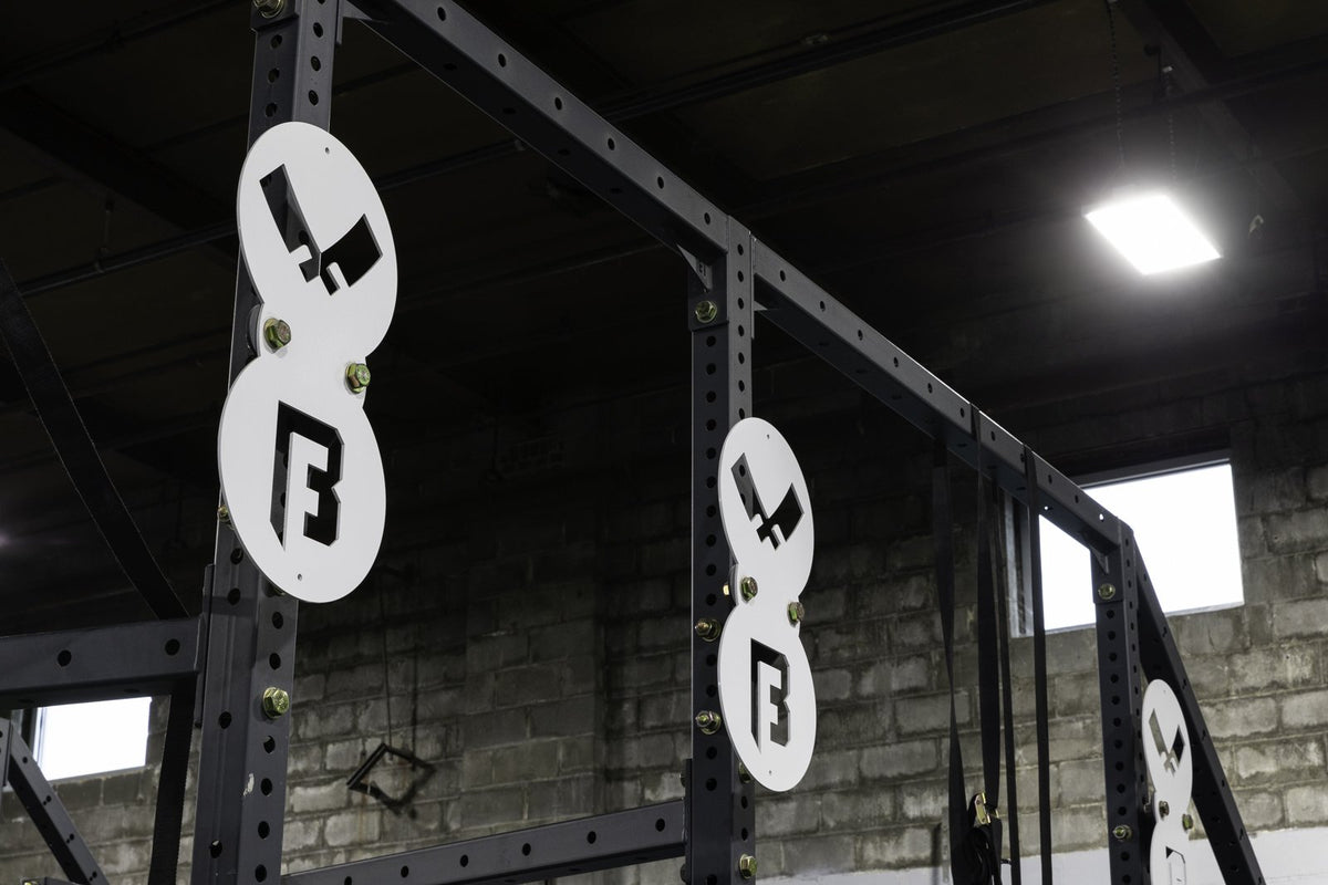 Custom logo plates on a BUILT rig at Butchertown CrossFit