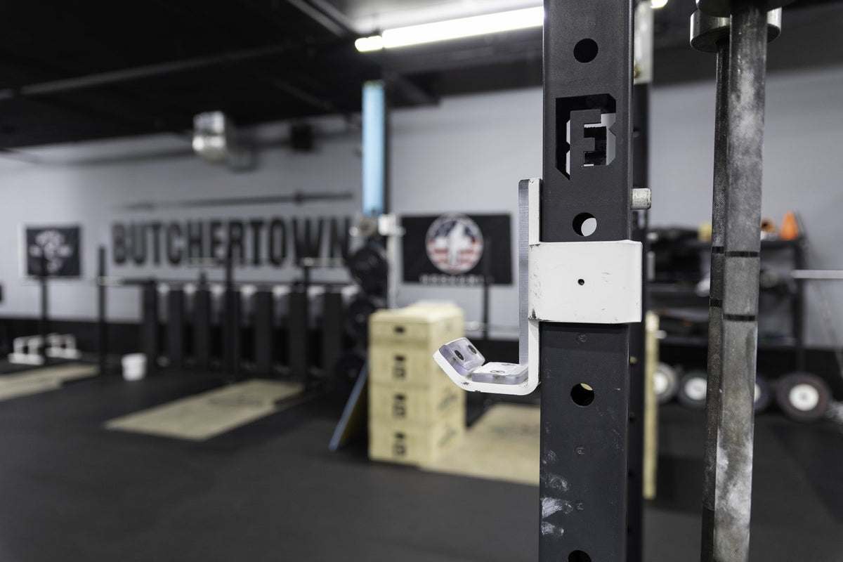 BUILT rig uprights and J-cups with the Butchertown CrossFit wall in the background