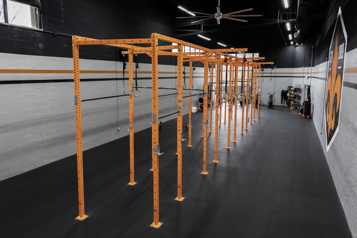 Long orange BUILT rig running the length of the Derby City CrossFit training floor