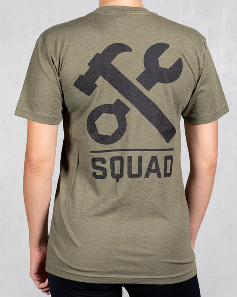 woman wearing military green squad tee from back